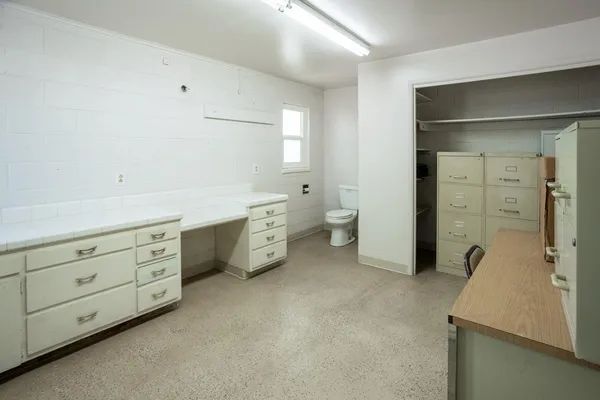 a room with furniture and a window