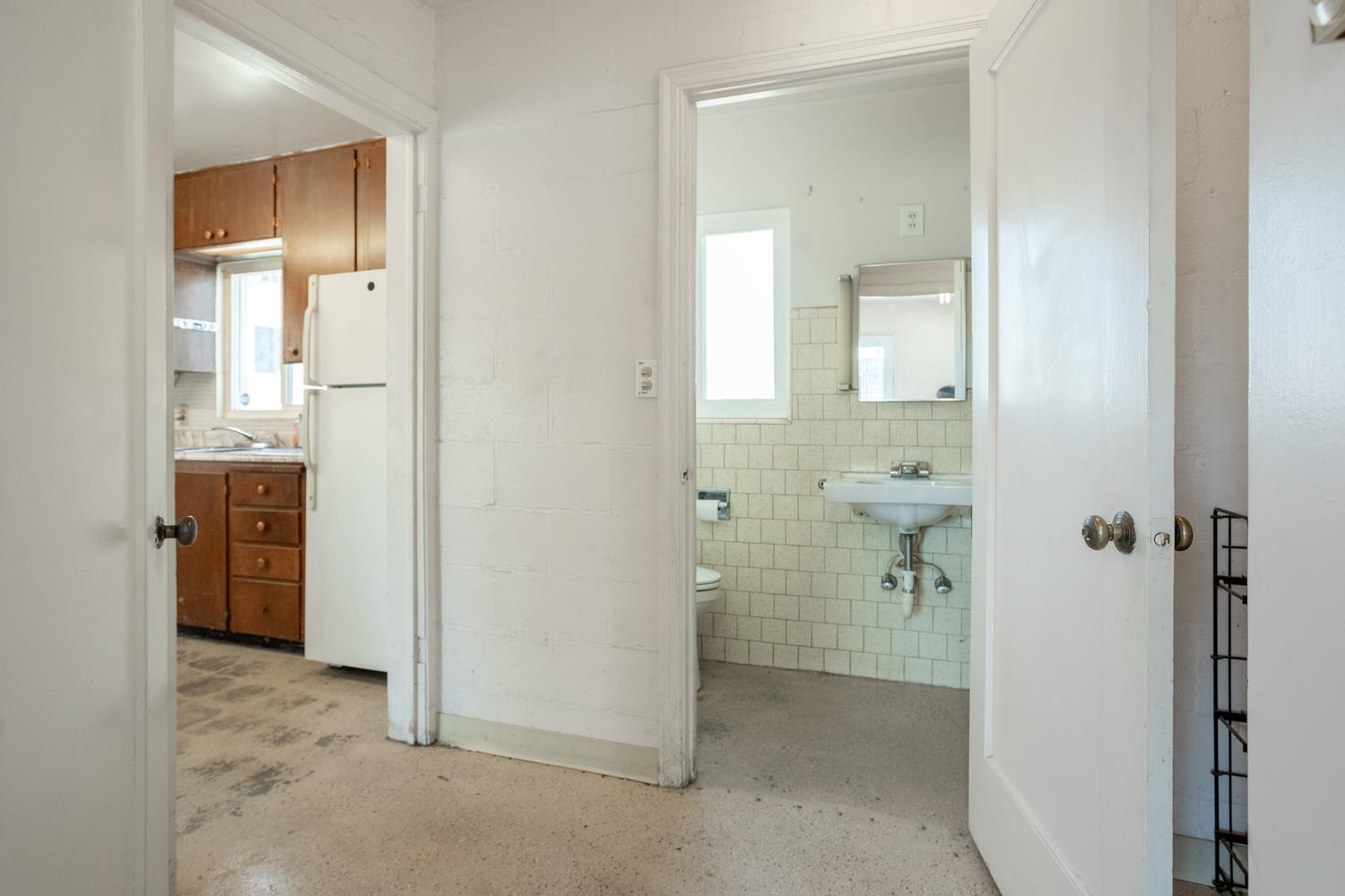 33 East Gridley Road Gridley, CA 95948 - Photo 31 of 50 wooden bathroom with a sink and mirror
