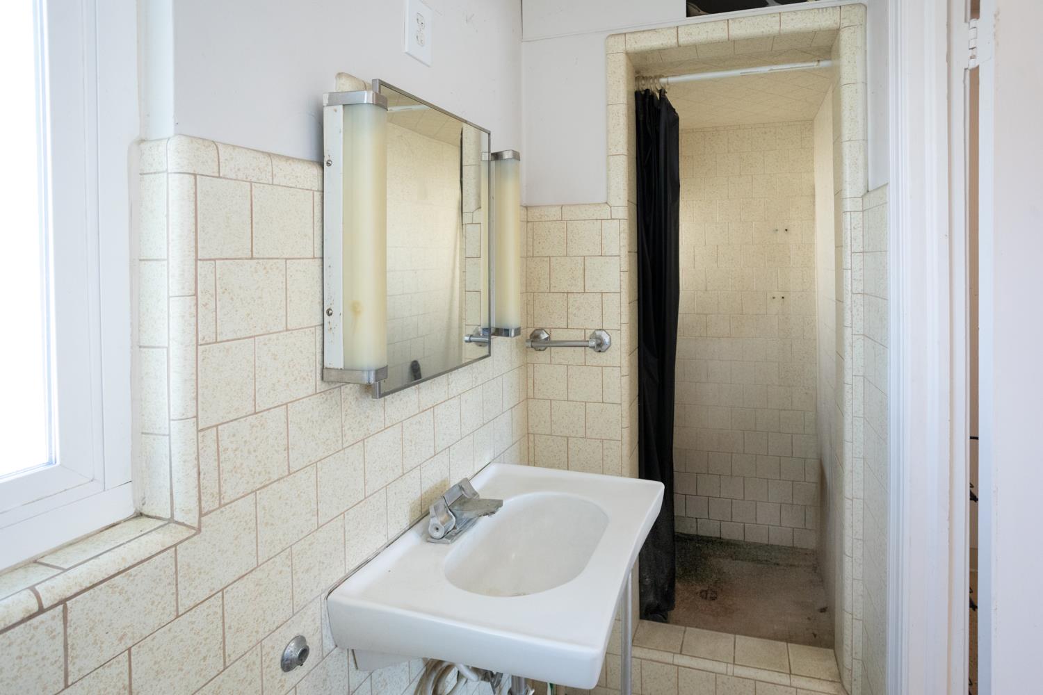 33 East Gridley Road Gridley, CA 95948 - Photo 33 of 50 a bathroom with a sink and mirror