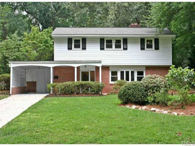 313 West Cornwall Road Cary, NC 27511 - Photo 1 of 1 Brick home has carport with attached shed and storage shelves. Also a covered walkway to front door and a side entrance from carport into the mud room/laundry room which also has plenty of cabinets for storage.
