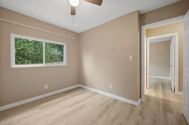 a view of a room with a large window