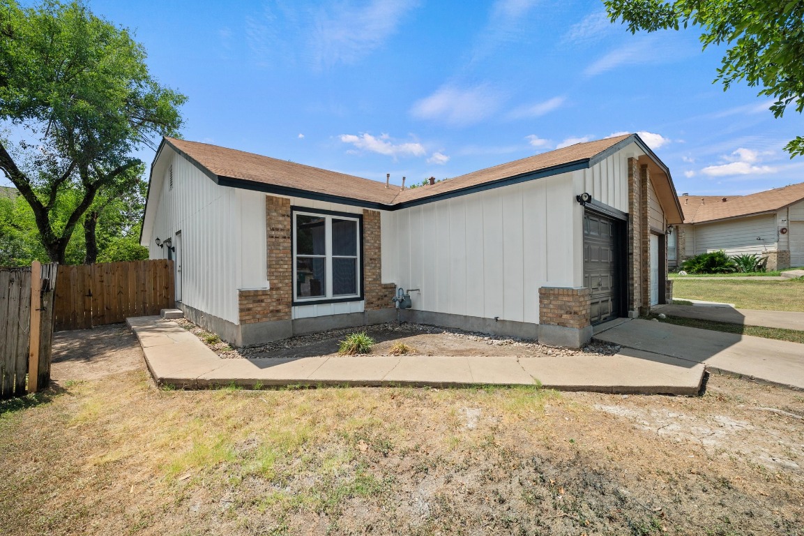16016 Fitchburg Circle Pflugerville, TX 78660 - Photo 2 of 22 a backyard of a house with seating space