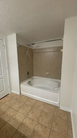 a bathroom with a bathtub