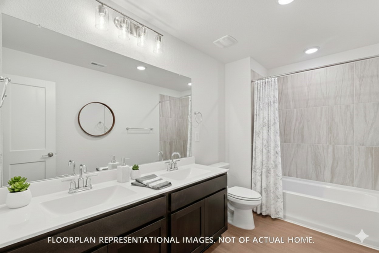 3407 Angus Farm Drive Rosenberg, TX 77471 - Photo 14 of 22 a bathroom with a granite countertop sink a toilet and a mirror