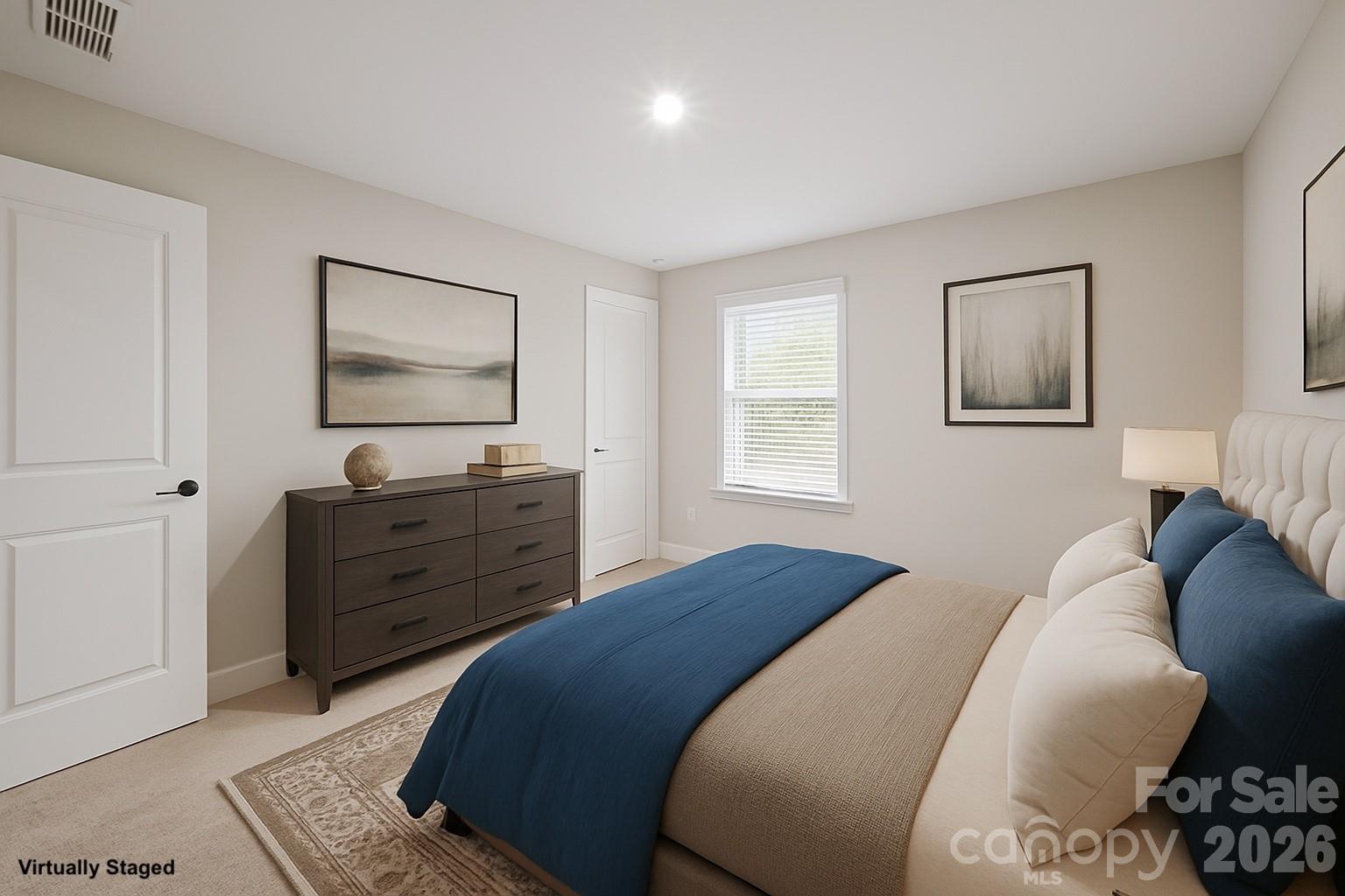 11224 Glasden Road Charlotte, NC 28278 - Photo 31 of 45 a bedroom with a bed and a dresser