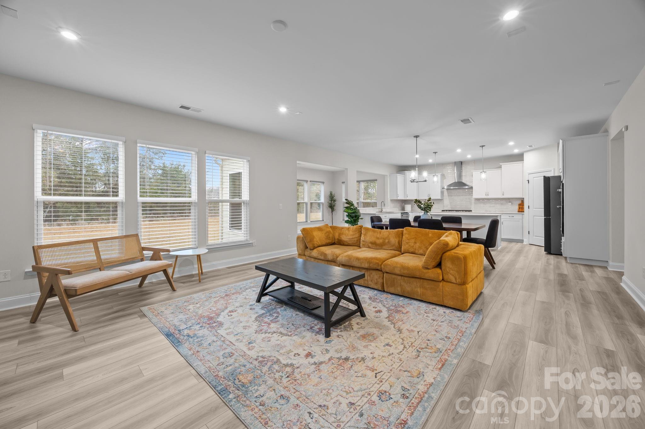 11224 Glasden Road Charlotte, NC 28278 - Photo 9 of 45 a living room with furniture and a window