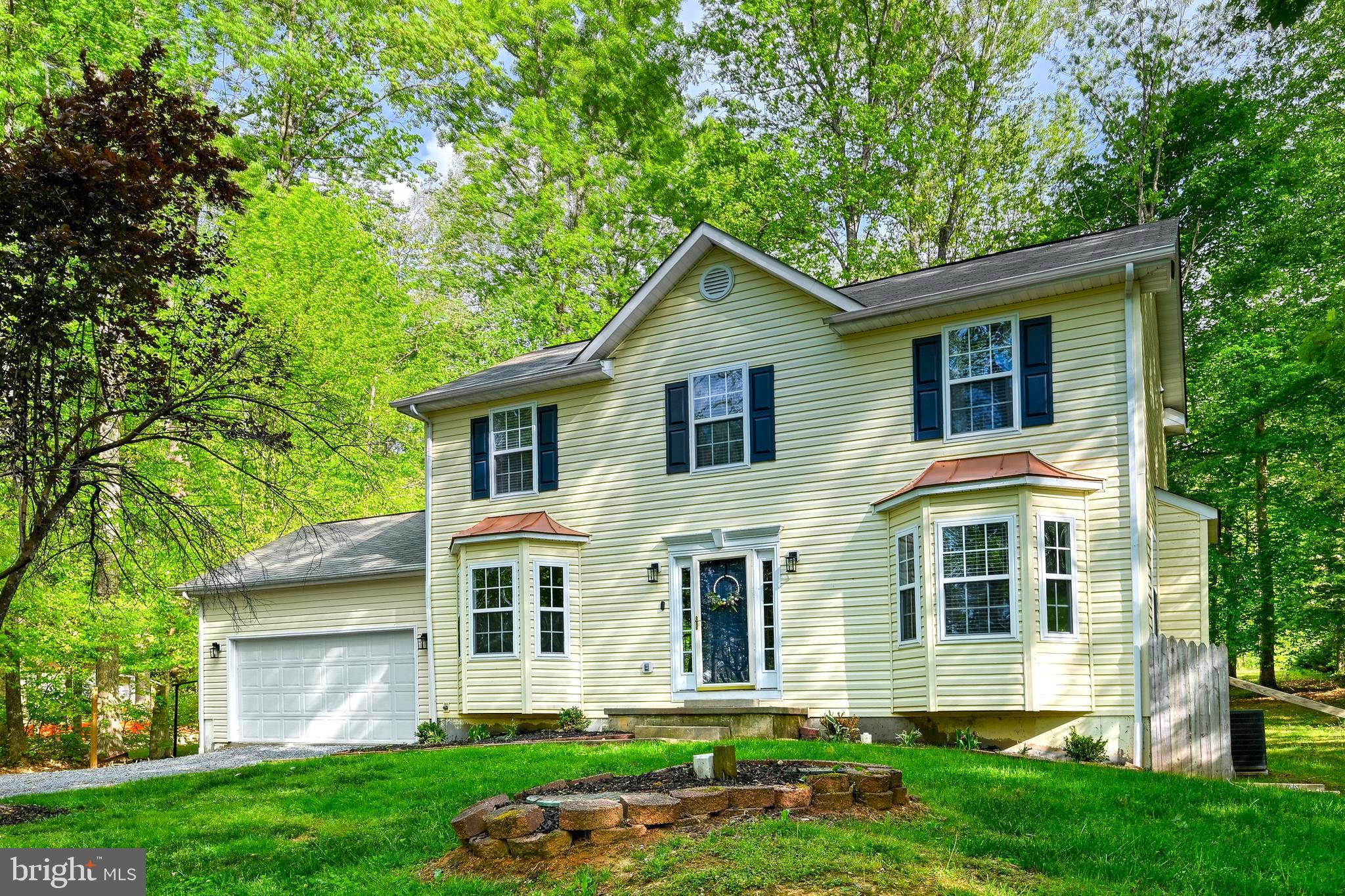 3605 Burton Road Bumpass, VA 23024 - Photo 2 of 39 front view of a house with a yard