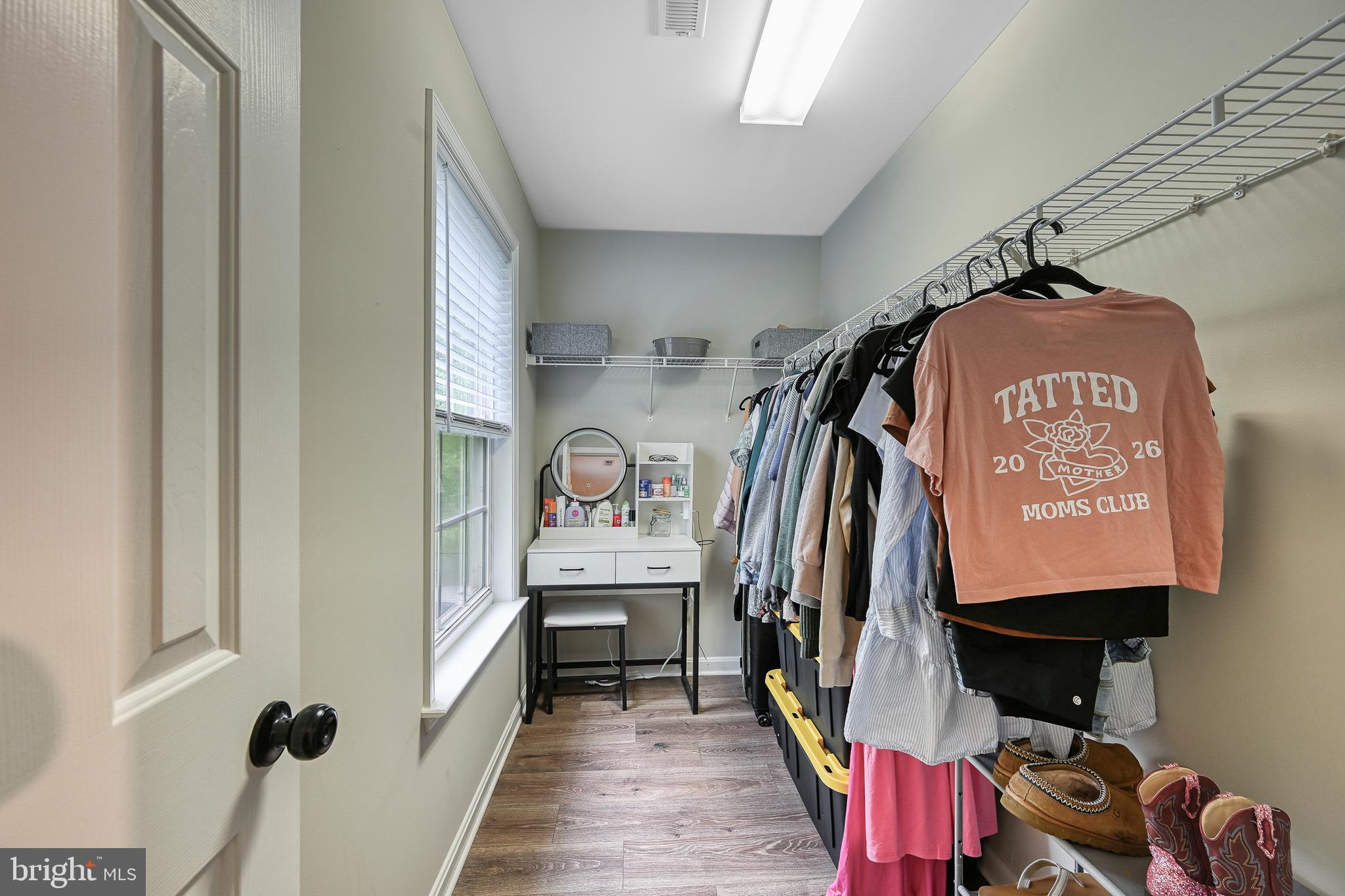 3605 Burton Road Bumpass, VA 23024 - Photo 21 of 39 a view of walk in closet with clothes and shoes