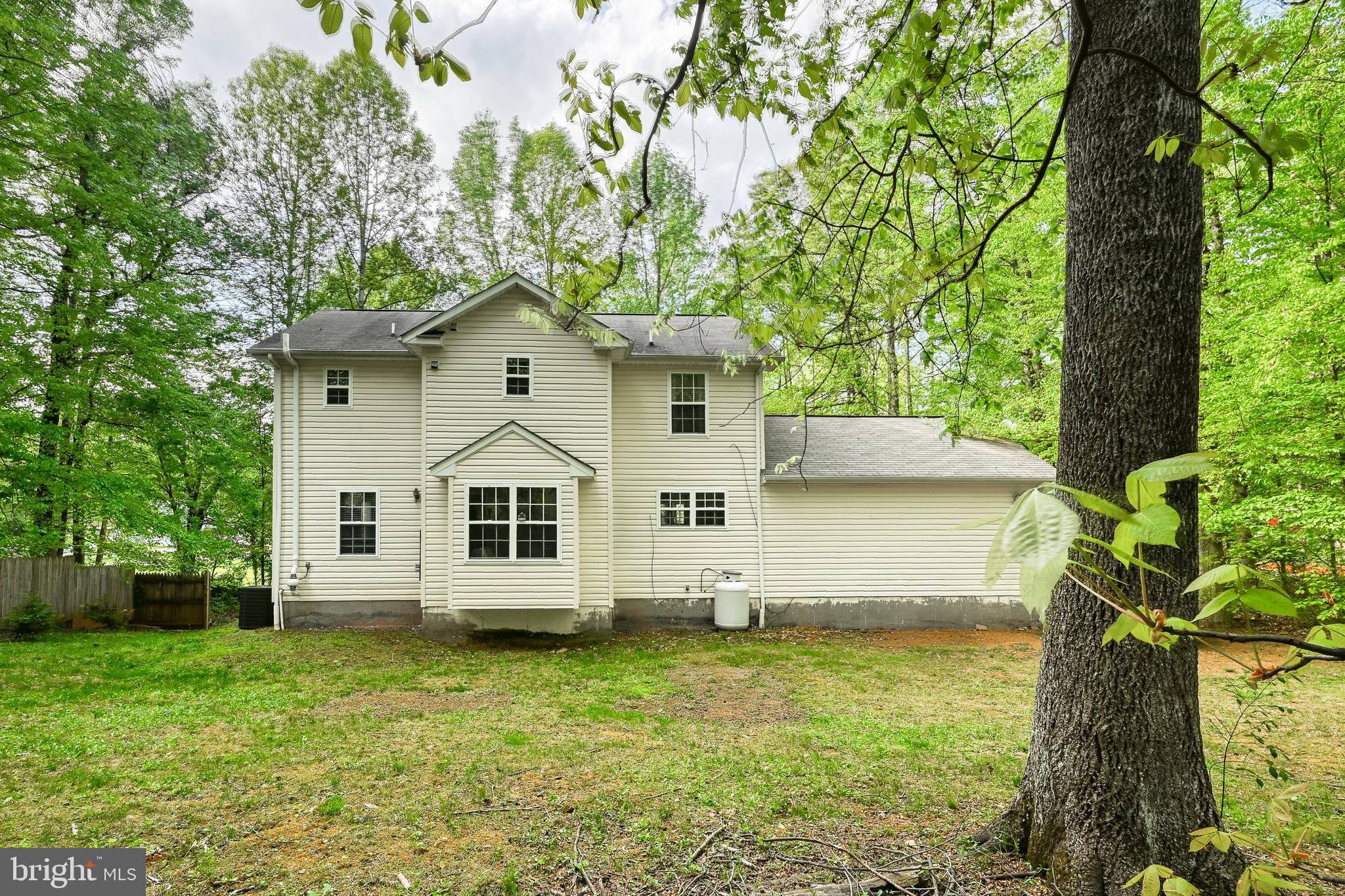 3605 Burton Road Bumpass, VA 23024 - Photo 35 of 39 a front view of a house with a garden