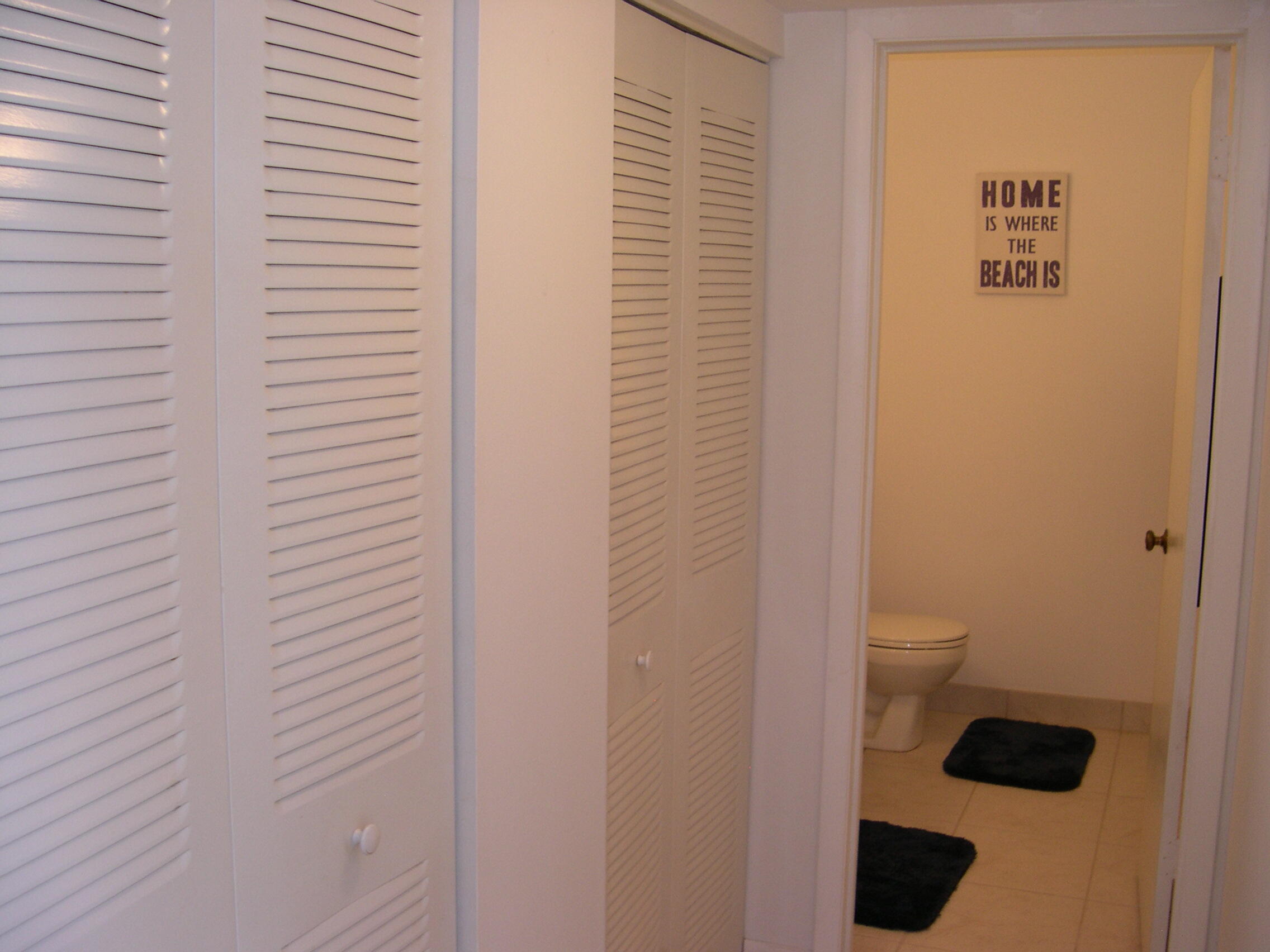 1172 Commodore Court, Unit 204 Fort Pierce, FL 34949 - Photo 28 of 41 Hall to guest bath.