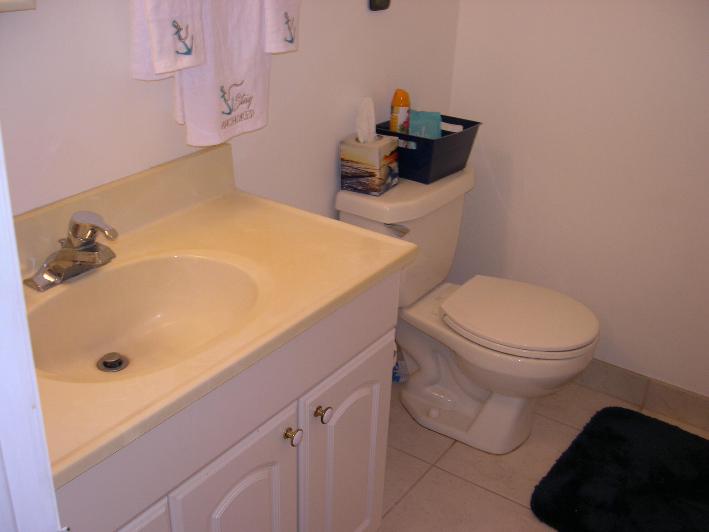 1172 Commodore Court, Unit 204 Fort Pierce, FL 34949 - Photo 29 of 41 Guest half bath