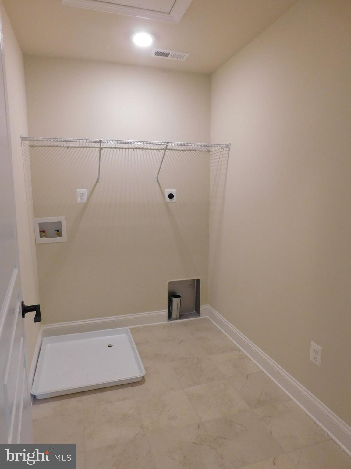 85 Simmons Ridge Road Prince Frederick, MD 20678 - Photo 26 of 64 Upper level laundry room