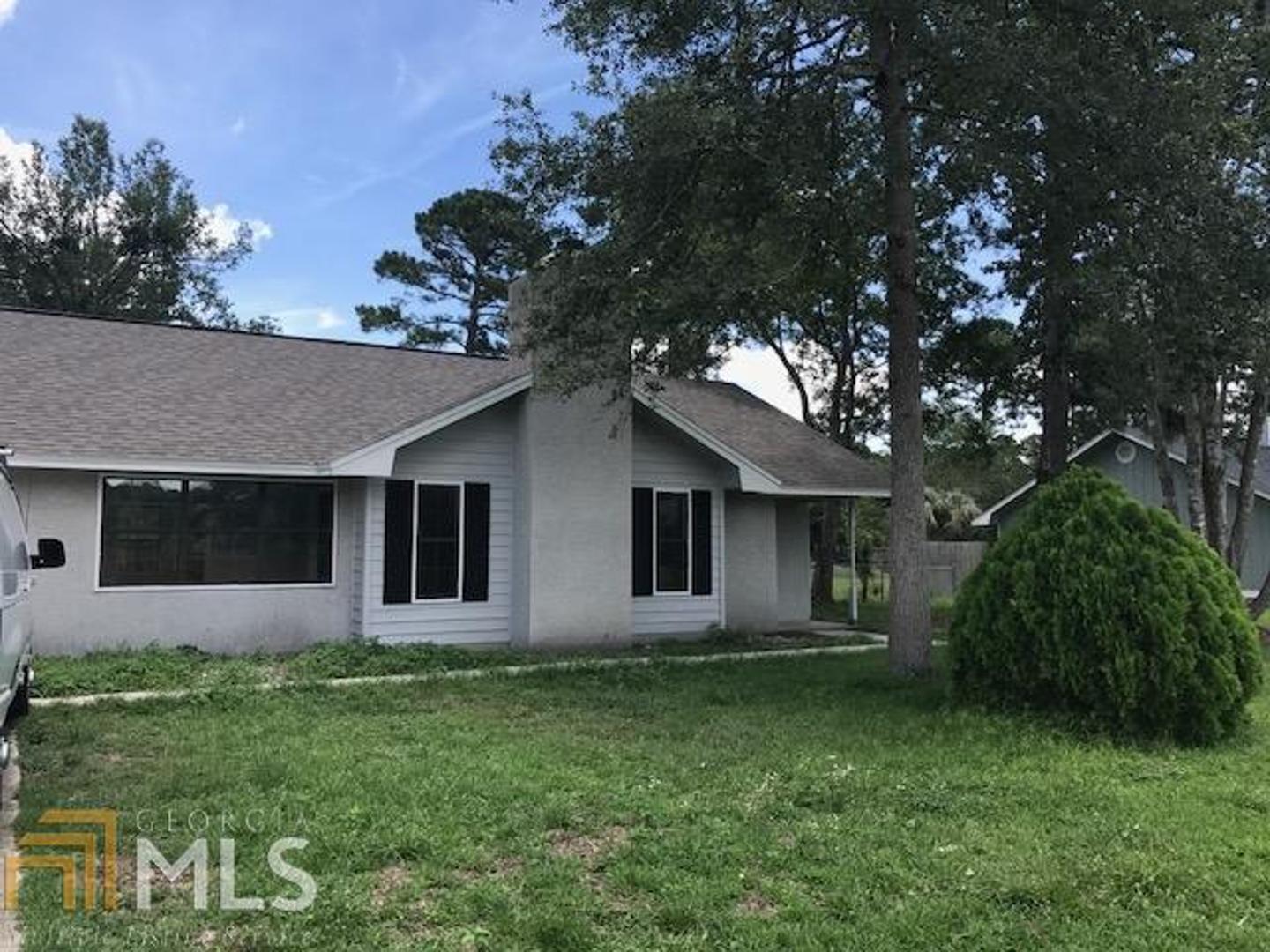 78 Green Wing Road Woodbine, GA 31569 - Photo 1 of 1 front view of house with a yard