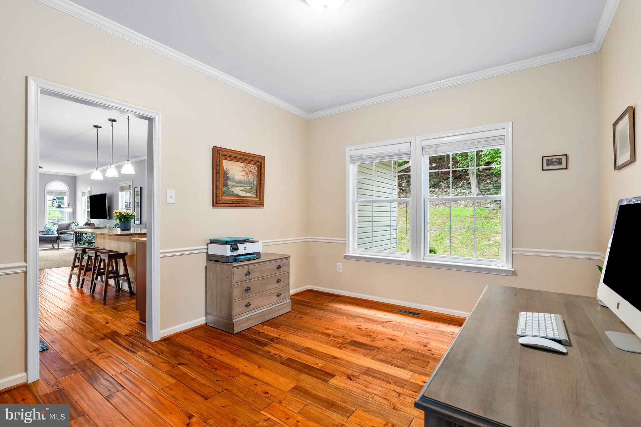 4644 Old Swimming Pool Road Braddock Heights, MD 21714 - Photo 21 of 60 a kitchen with a wooden floor and a large window
