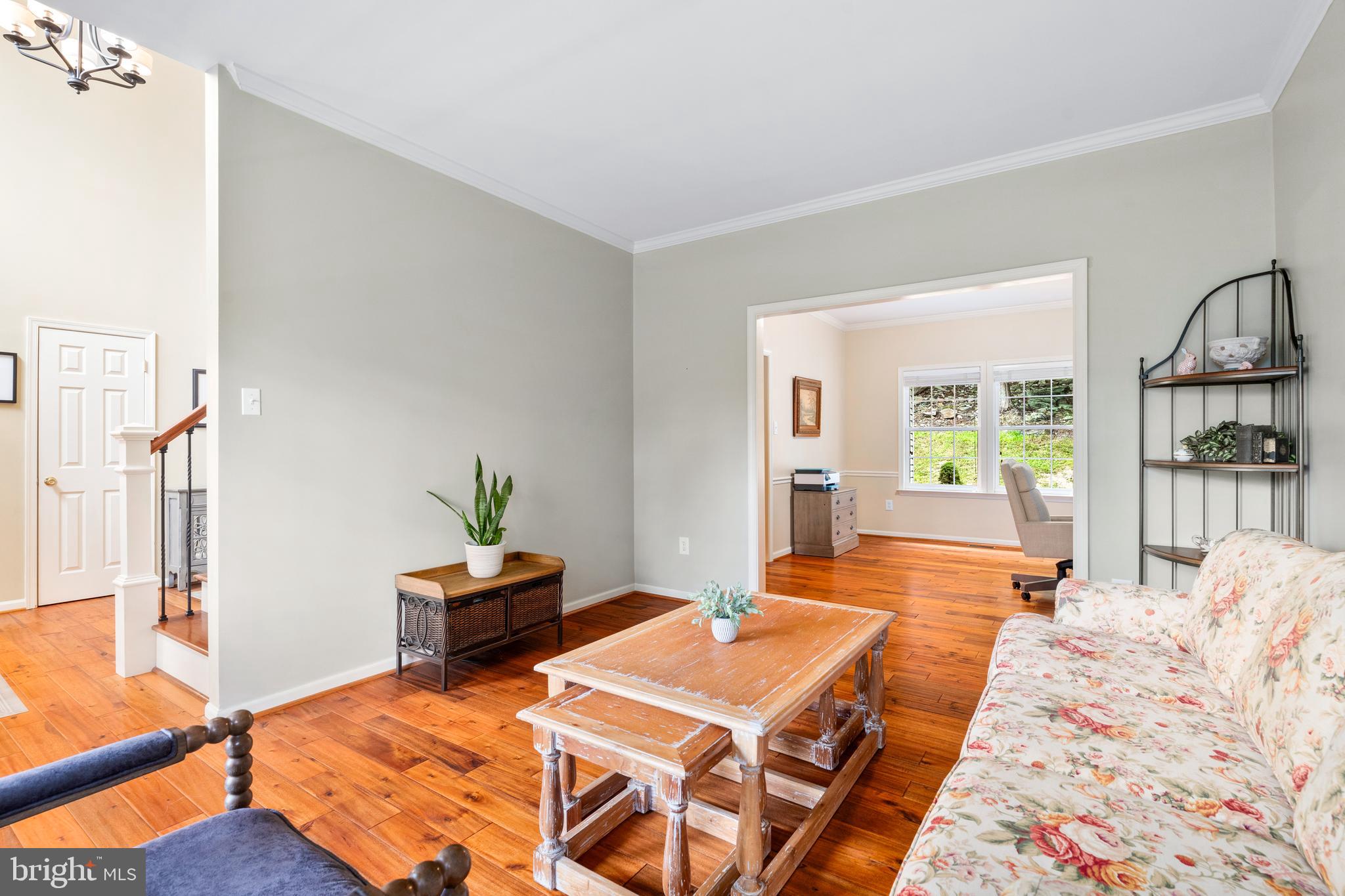 4644 Old Swimming Pool Road Braddock Heights, MD 21714 - Photo 23 of 60 a bedroom with a bed and a table in it