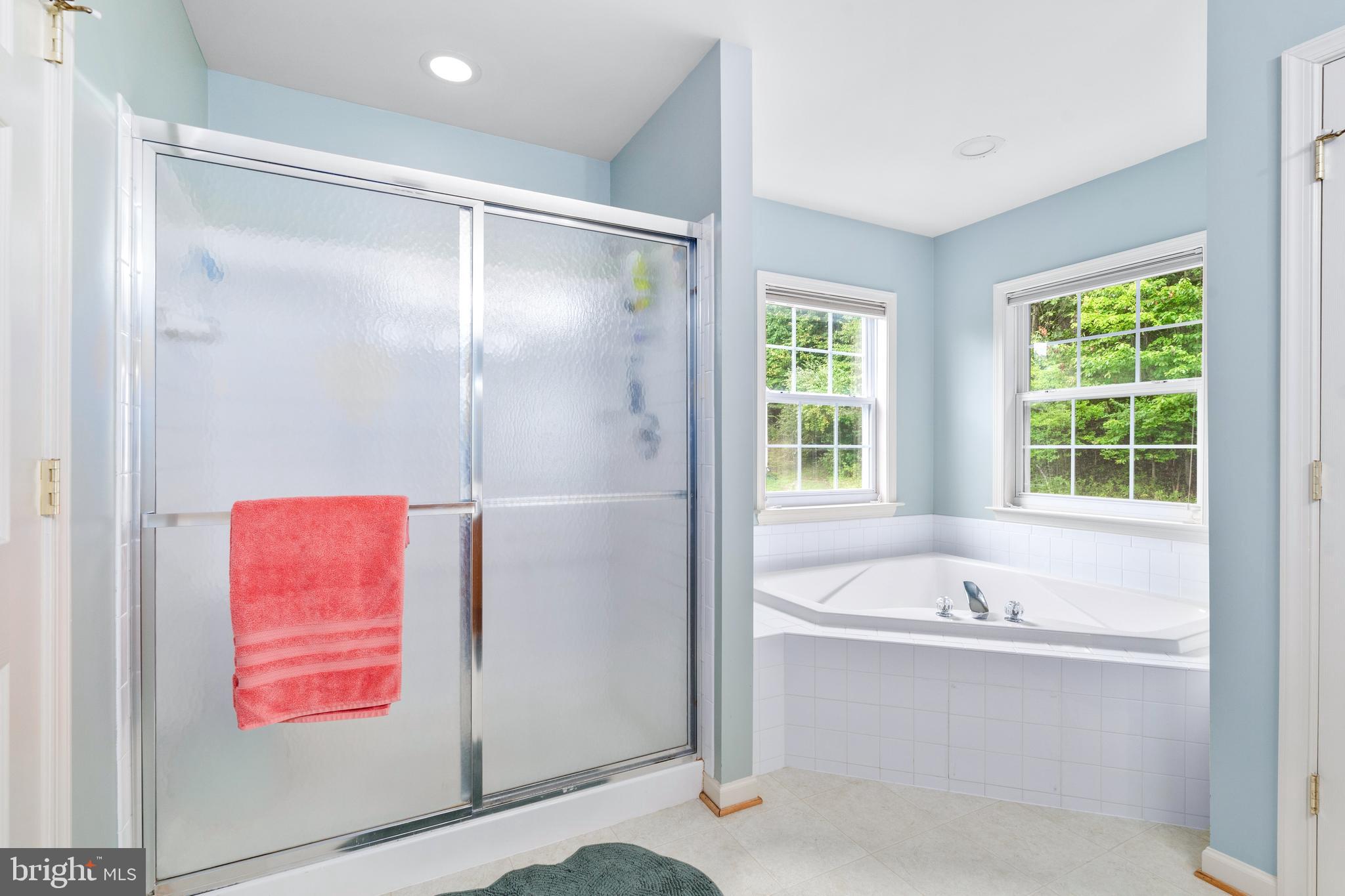 4644 Old Swimming Pool Road Braddock Heights, MD 21714 - Photo 31 of 60 a bathroom with a tub shower and sink