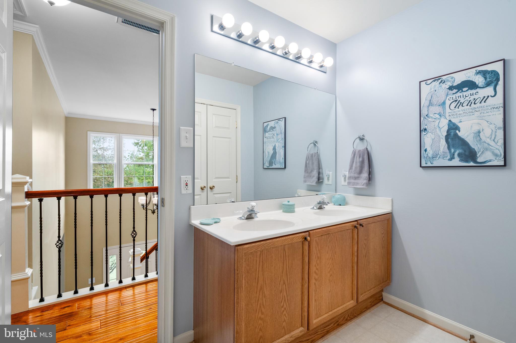 4644 Old Swimming Pool Road Braddock Heights, MD 21714 - Photo 34 of 60 a en suite bathroom with a double vanity sink and a mirror