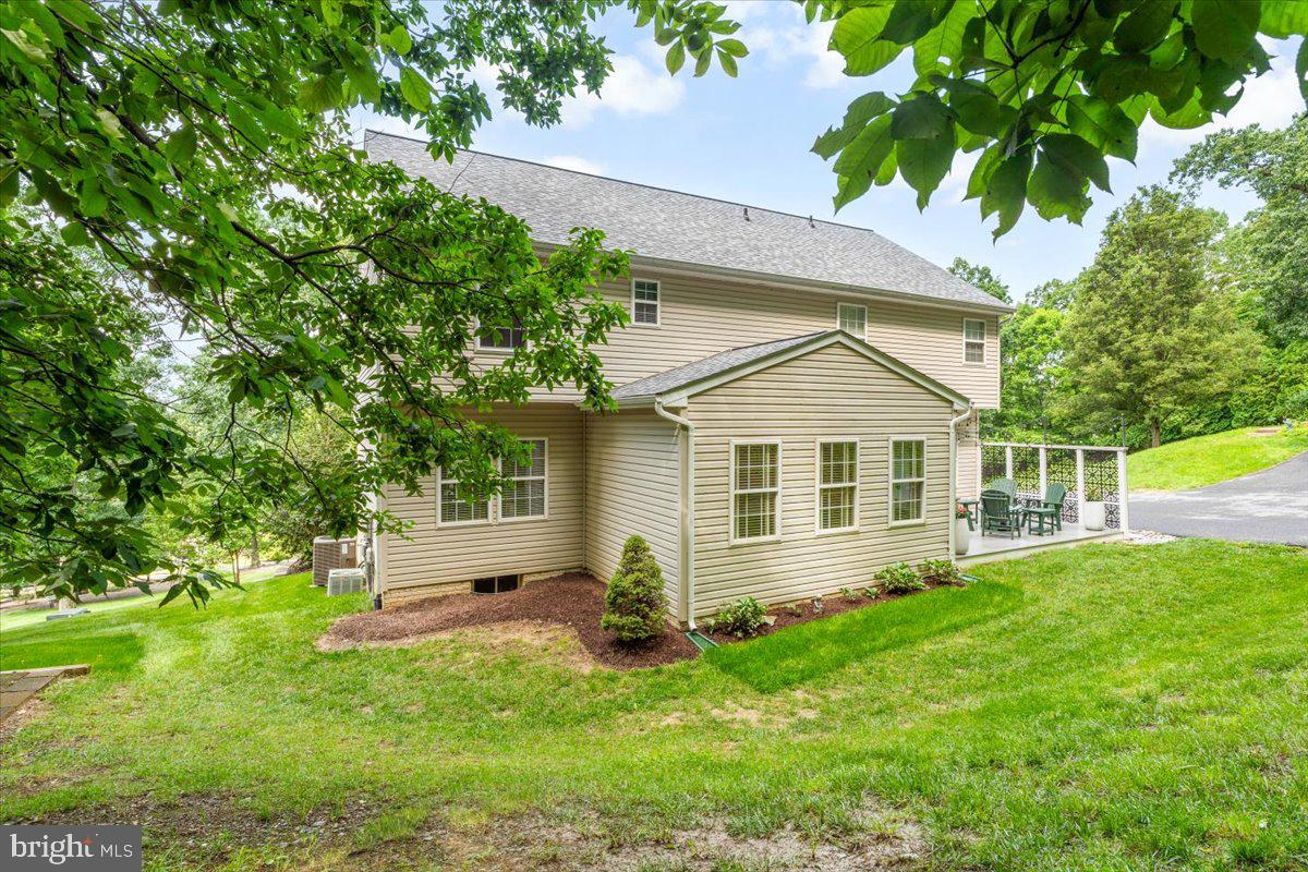 4644 Old Swimming Pool Road Braddock Heights, MD 21714 - Photo 43 of 60 a view of a house with backyard and a tree