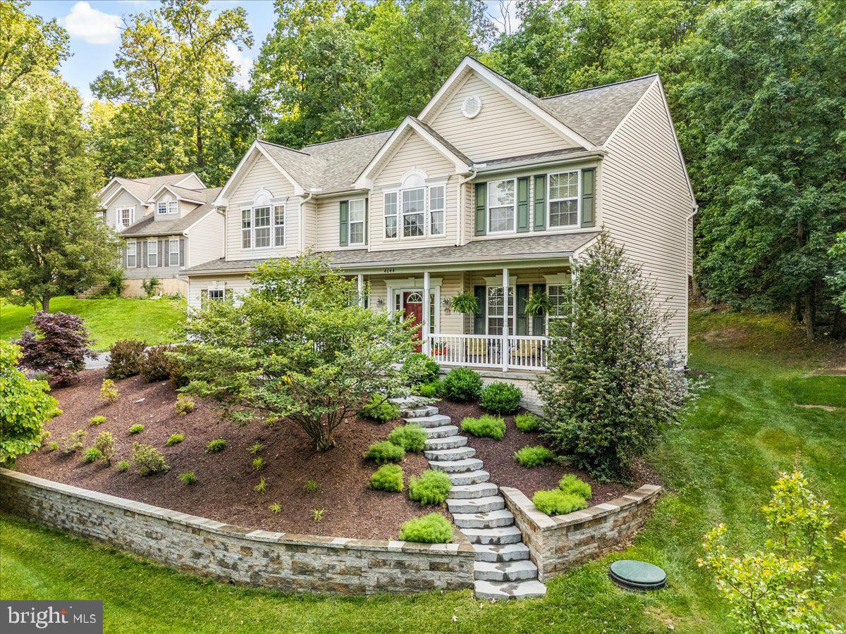 4644 Old Swimming Pool Road Braddock Heights, MD 21714 - Photo 45 of 60 a view of a white house with a small yard plants and large tree
