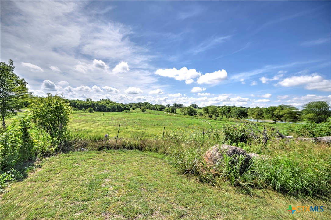 7085 Asa Road Temple, TX 76504 - Photo 11 of 16 a view of a lake with a yard