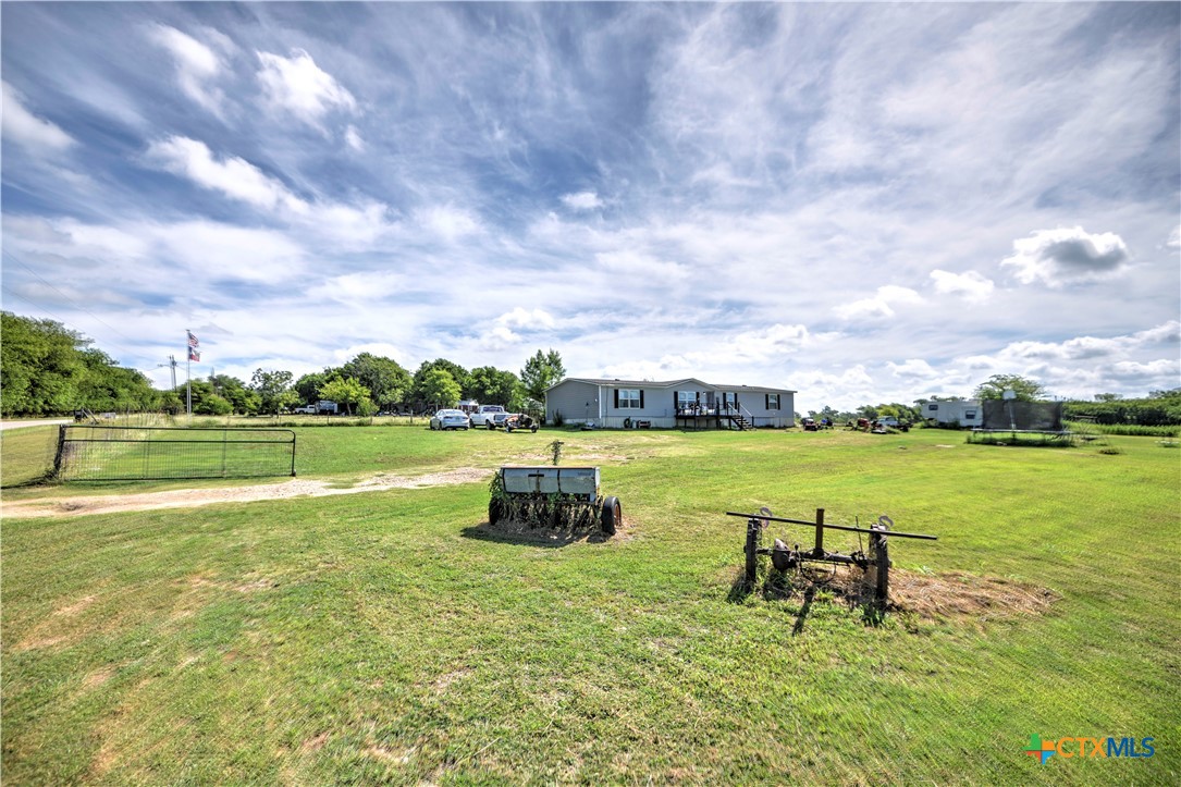7085 Asa Road Temple, TX 76504 - Photo 9 of 16 a view of a lake with couches in the outdoor space