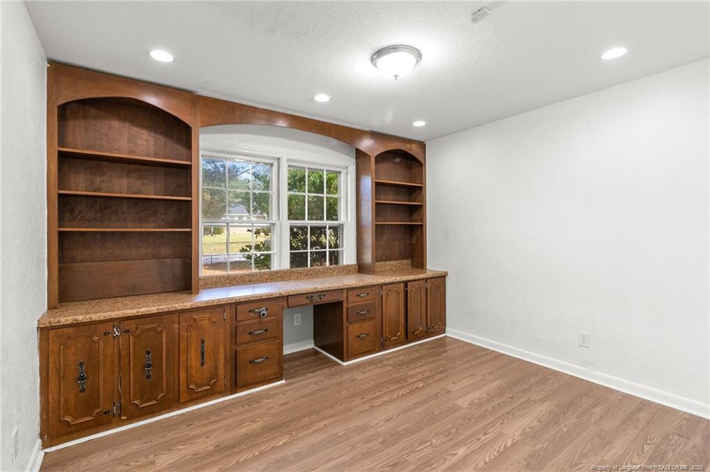 161 Summerhill Road Fayetteville, NC 28303 - Photo 18 of 36 a view of a kitchen with a sink and a window