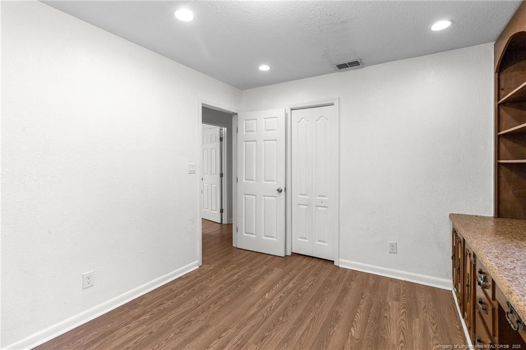 161 Summerhill Road Fayetteville, NC 28303 - Photo 20 of 36 a view of a livingroom with wooden floor