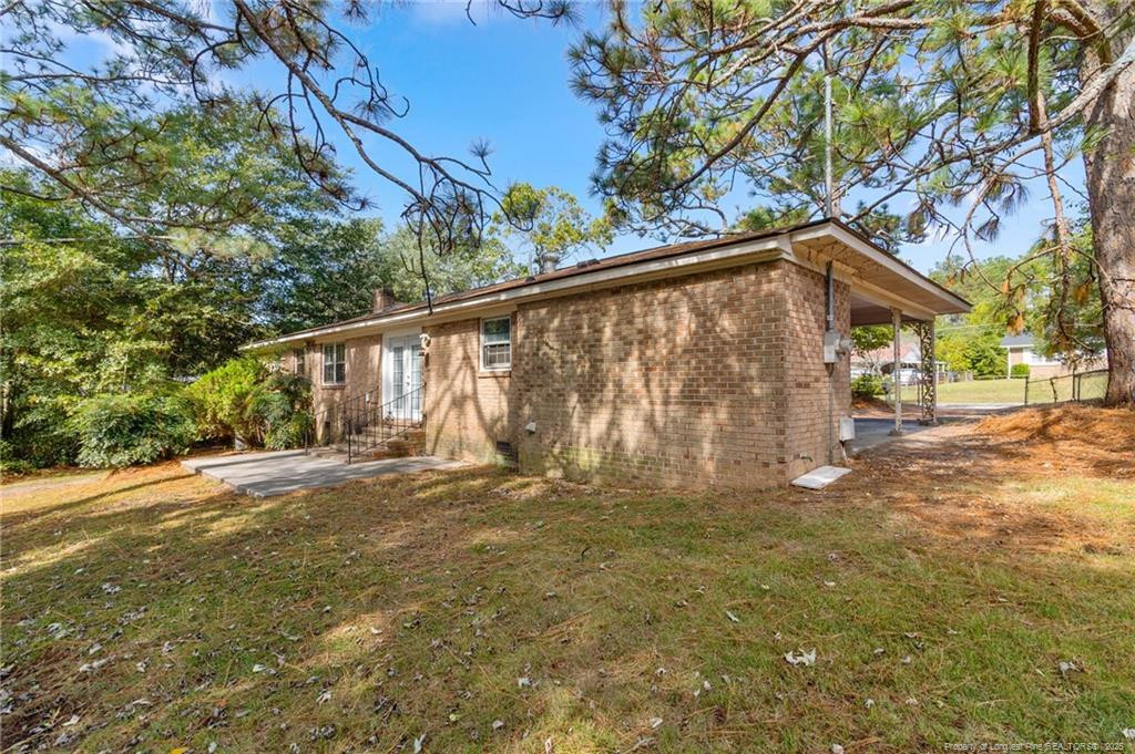 161 Summerhill Road Fayetteville, NC 28303 - Photo 35 of 36 a view of backyard with green space