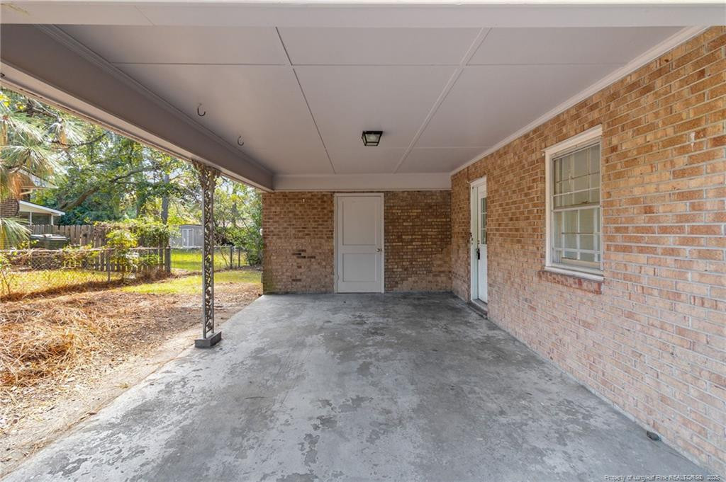 161 Summerhill Road Fayetteville, NC 28303 - Photo 5 of 36 a view of a livingroom with an empty space and balcony