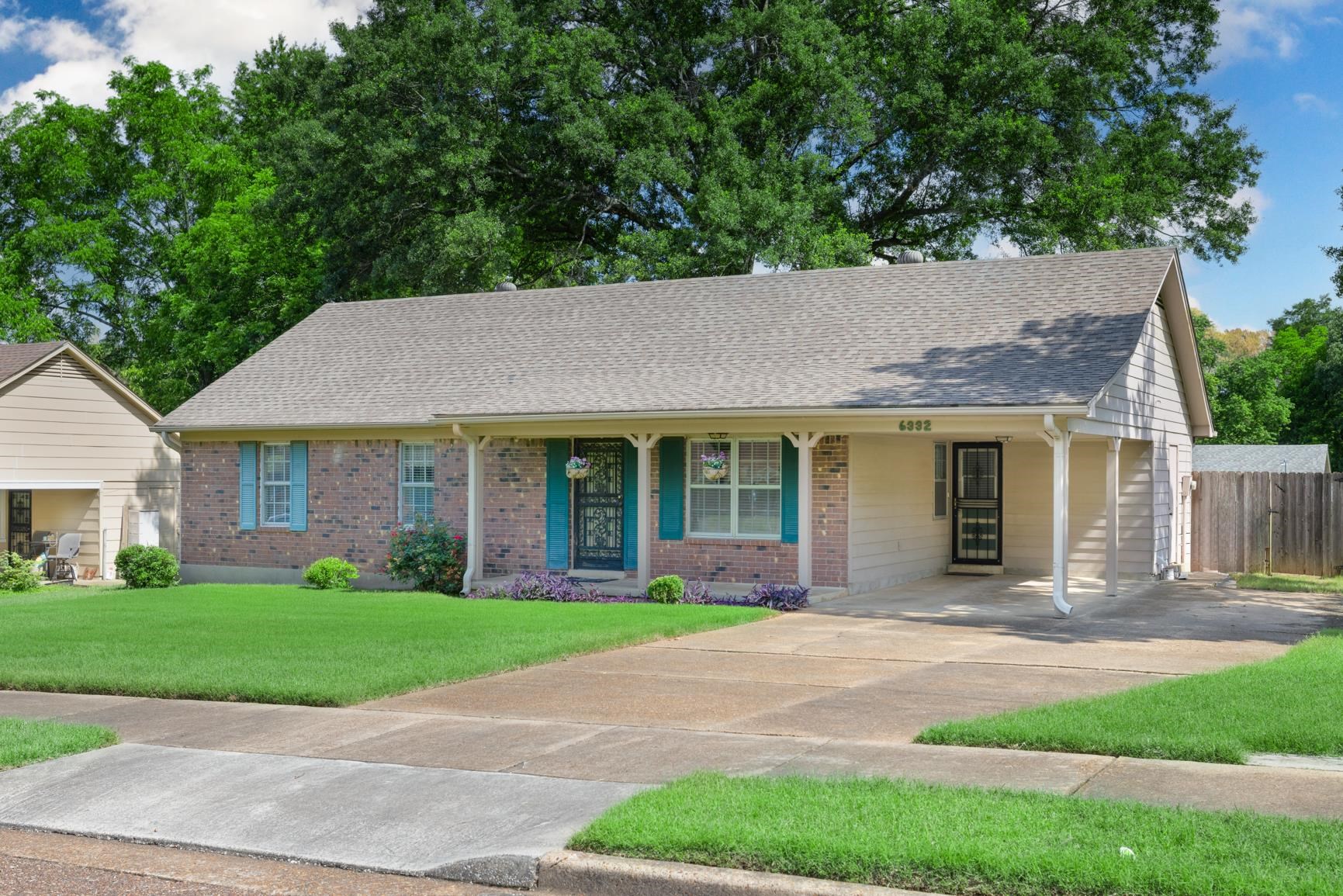 6332 Bardstown Road Bartlett, TN 38134 - Photo 1 of 25 Single story home with driveway, brick siding, a shingled roof, and a carport