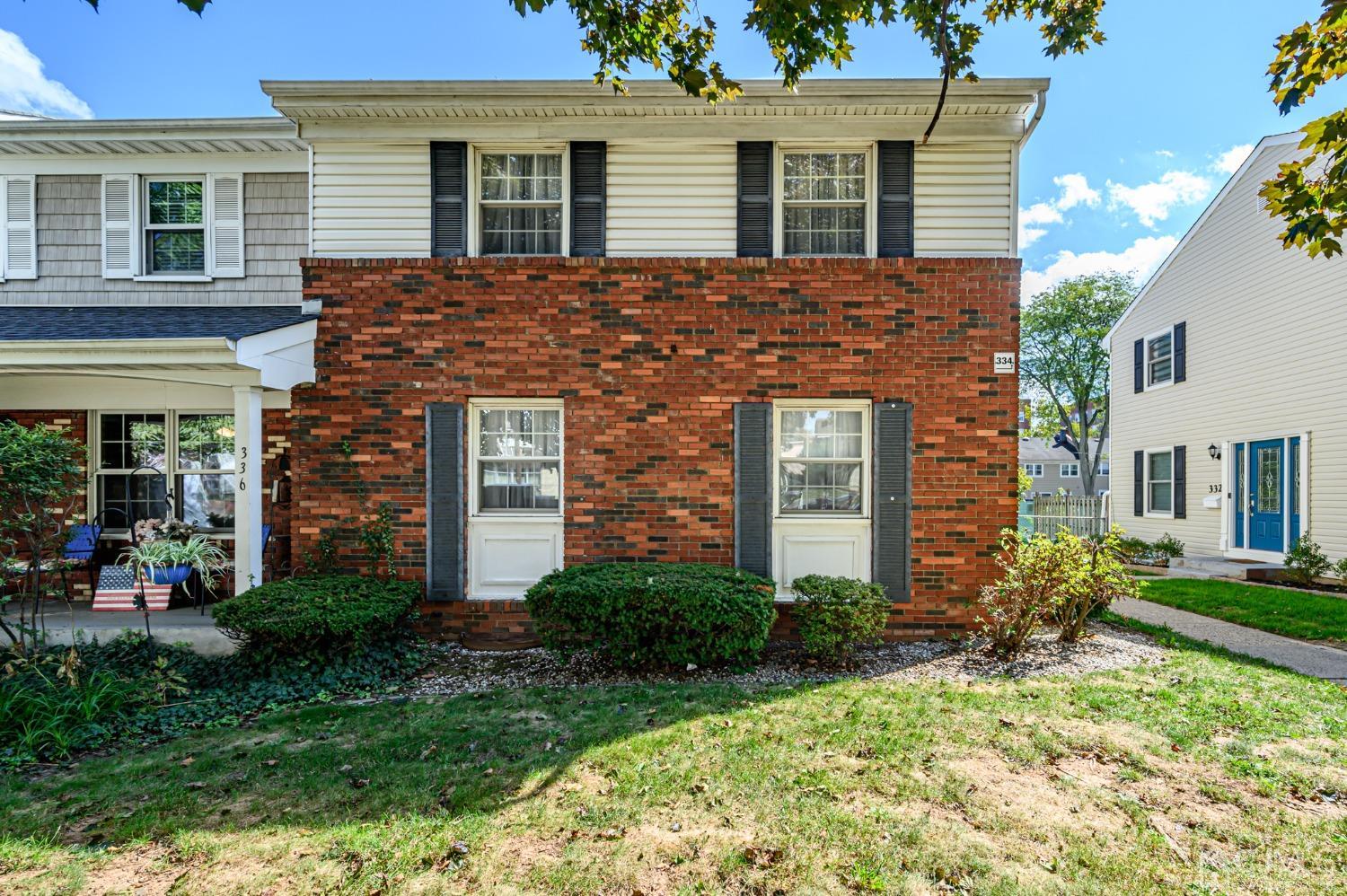 334 High Street Perth Amboy, NJ 08861 - Photo 1 of 33 a brick house with a large windows
