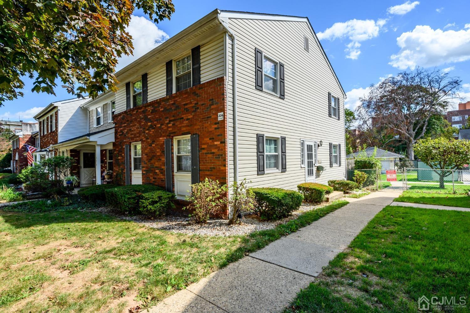 334 High Street Perth Amboy, NJ 08861 - Photo 2 of 33 a front view of a house with a yard