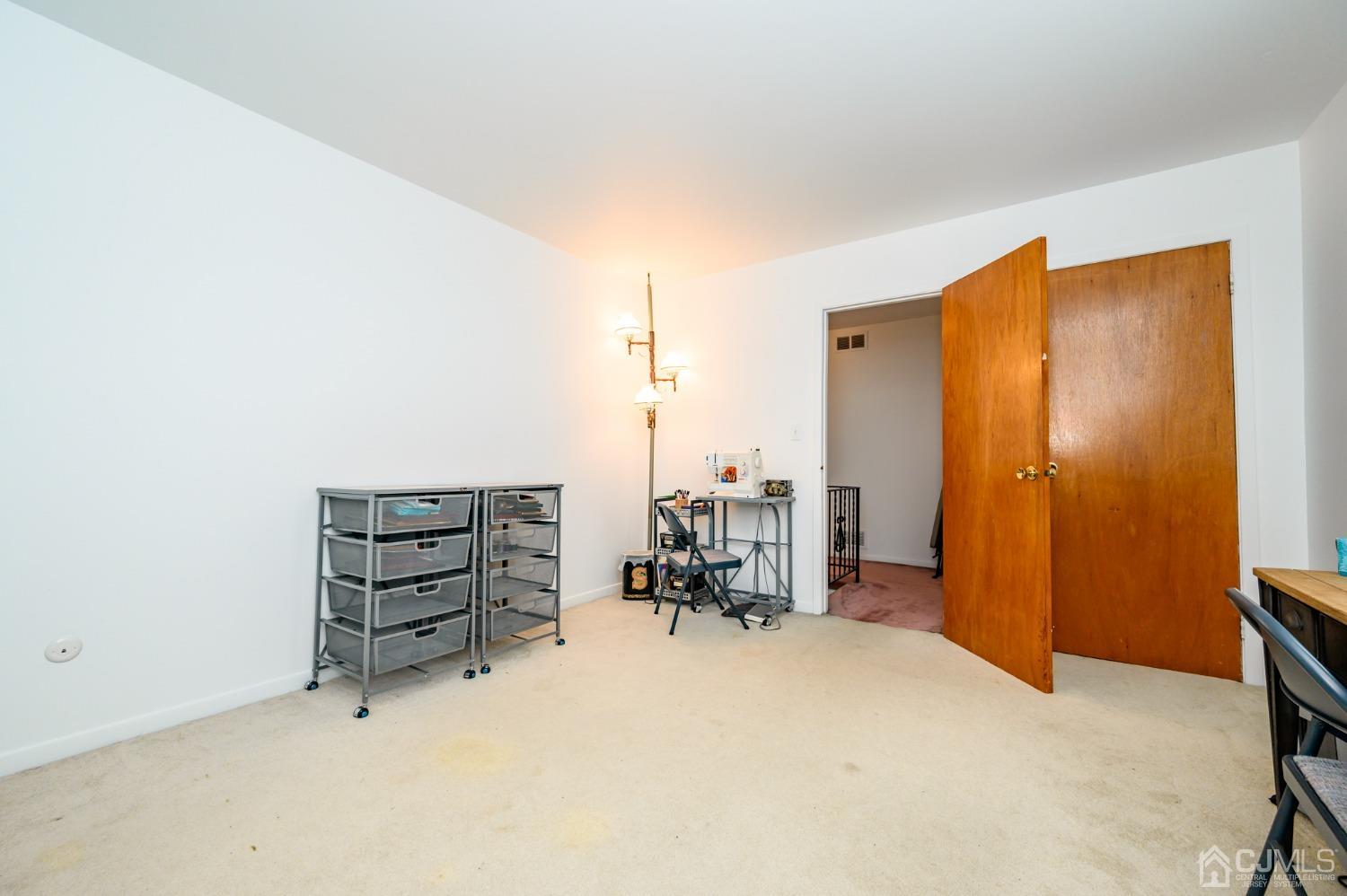 334 High Street Perth Amboy, NJ 08861 - Photo 21 of 33 a view of room with furniture and a window