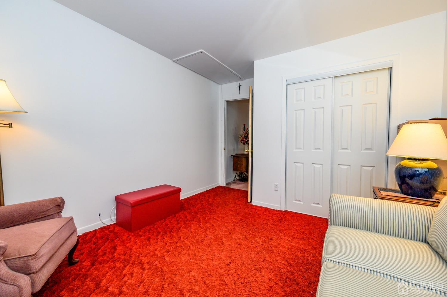 334 High Street Perth Amboy, NJ 08861 - Photo 23 of 33 a bedroom with bed and a lamp