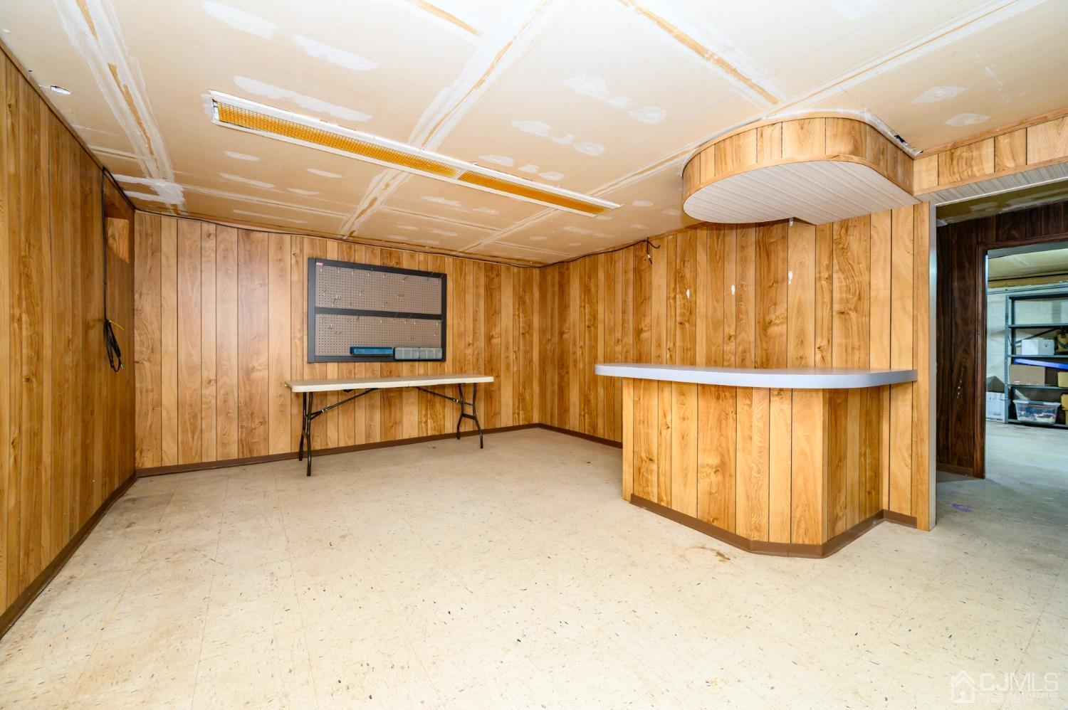 334 High Street Perth Amboy, NJ 08861 - Photo 27 of 33 a view of an empty room with wooden floor