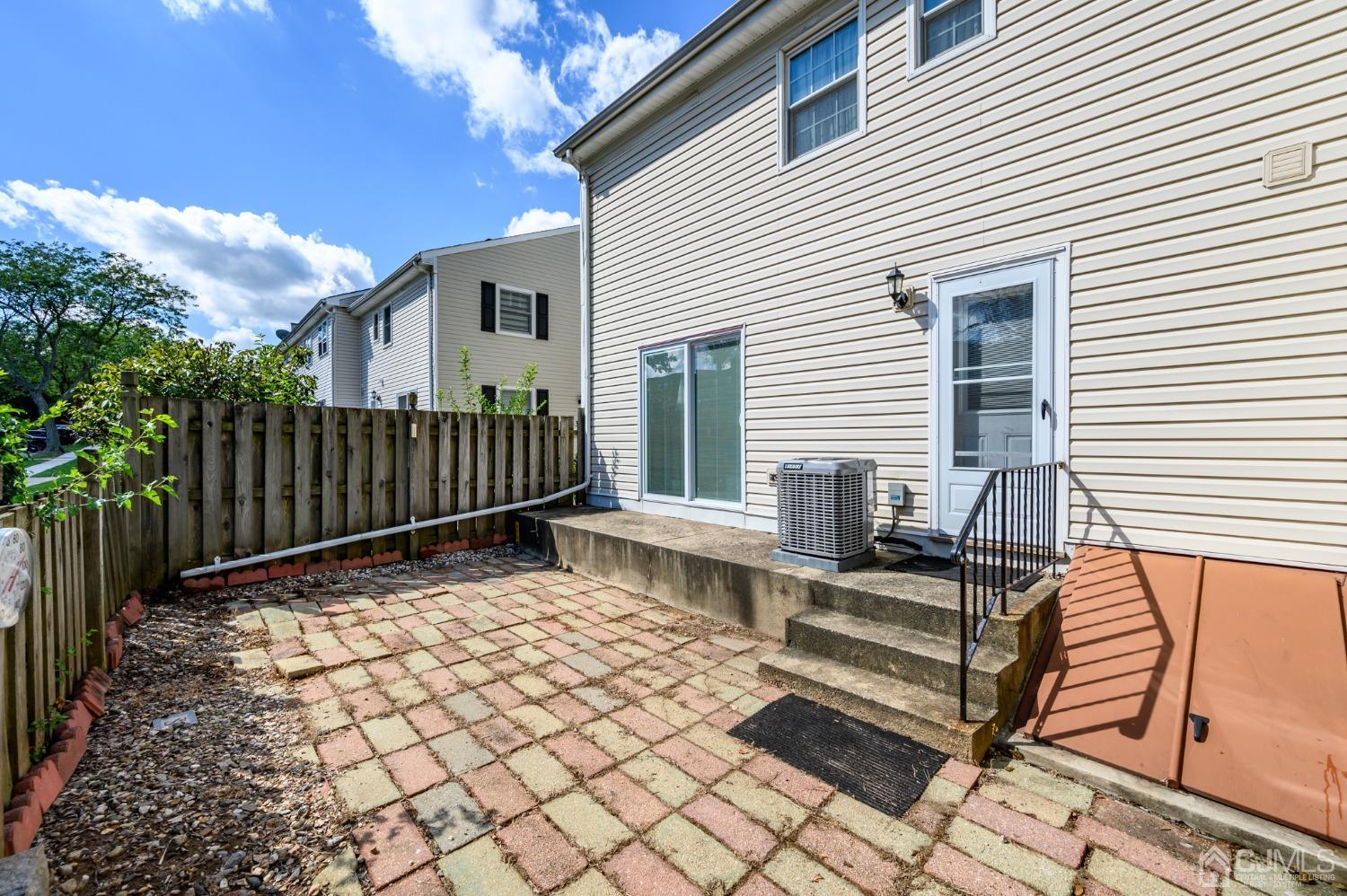 334 High Street Perth Amboy, NJ 08861 - Photo 29 of 33 a view of a house with wooden fence