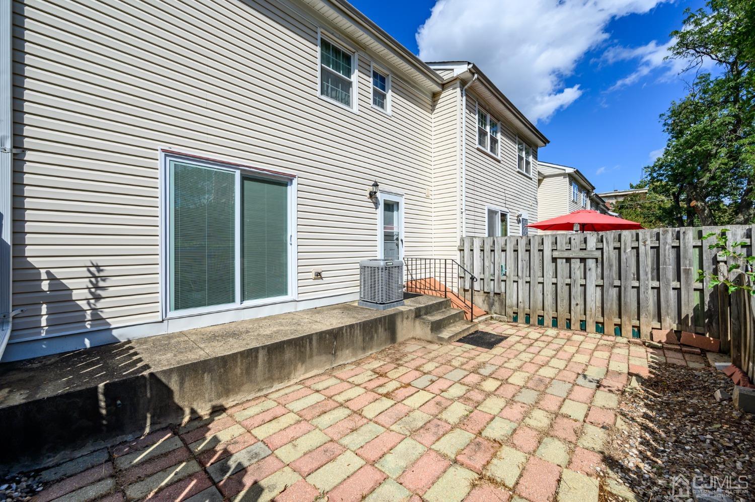 334 High Street Perth Amboy, NJ 08861 - Photo 30 of 33 a view of a house with wooden fence
