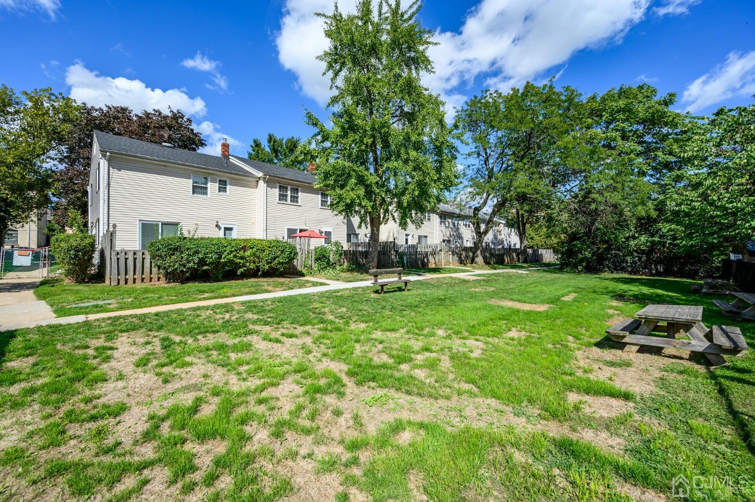 334 High Street Perth Amboy, NJ 08861 - Photo 32 of 33 a front view of house with yard and green space
