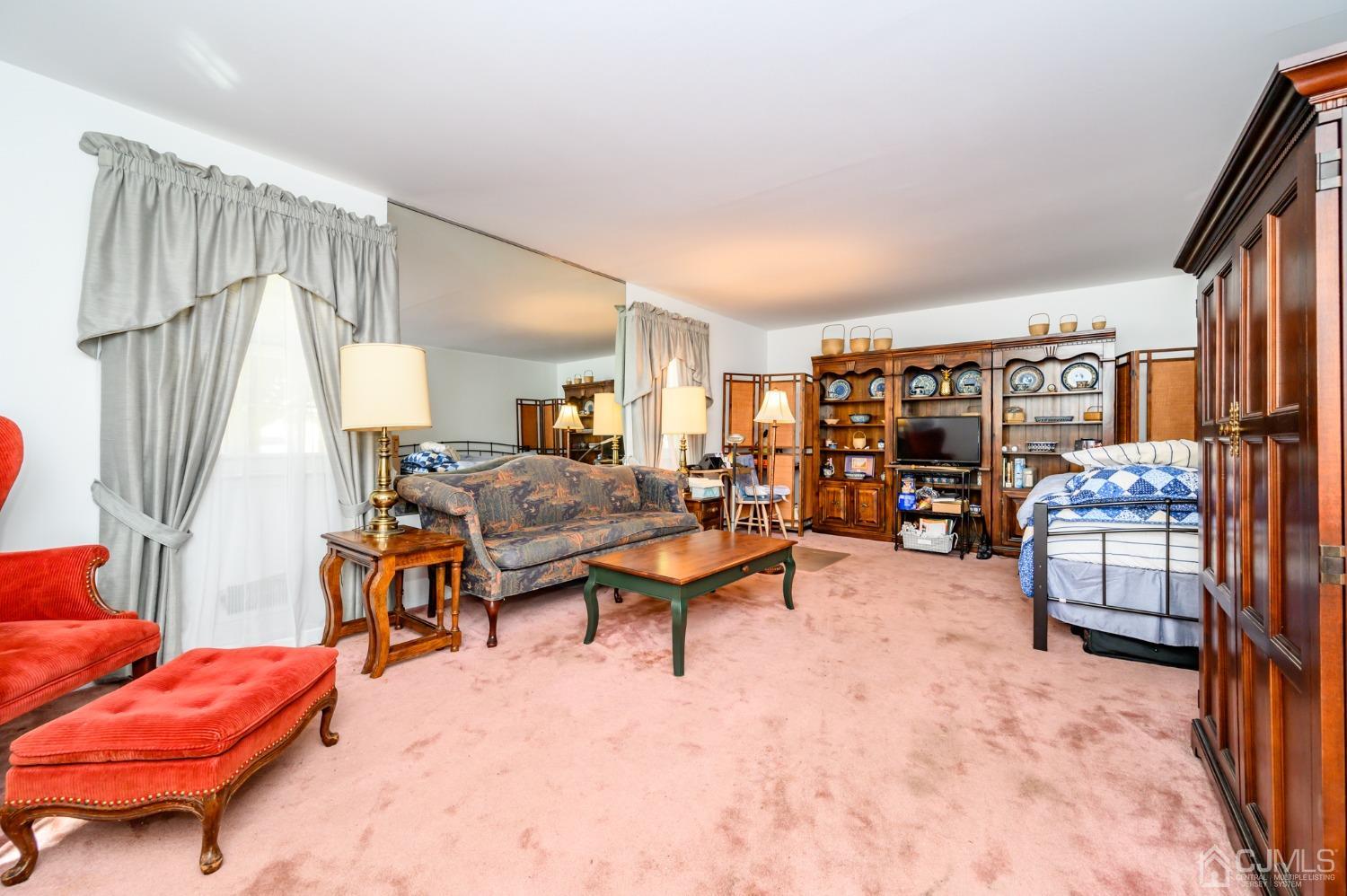 334 High Street Perth Amboy, NJ 08861 - Photo 5 of 33 a living room filled with furniture and a couch