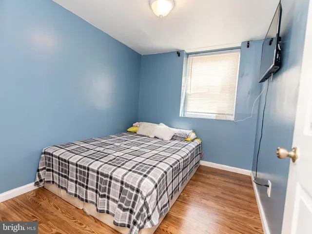 a bathroom with a sink mirror toilet and bathtub
