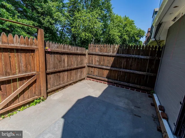 a view of swimming pool with a yard