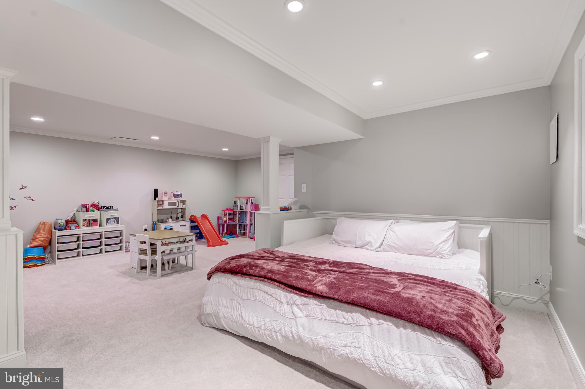 11926 Appling Valley Road Fairfax, VA 22030 - Photo 45 of 60 a bedroom with a bed and a couch