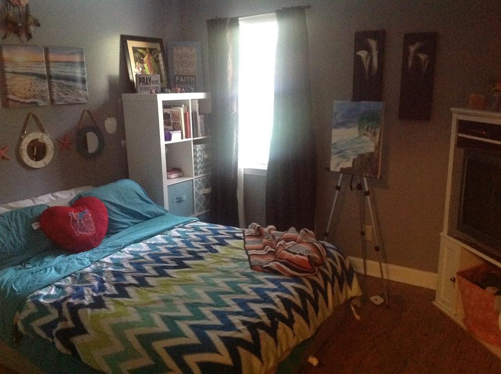 356 Elam Church Road Gray, GA 31032 - Photo 24 of 28 a bedroom with a bed and a closet