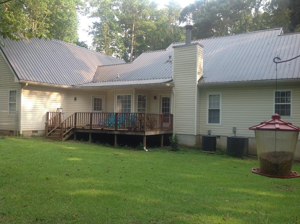 356 Elam Church Road Gray, GA 31032 - Photo 25 of 28 a view of a house with a yard and sitting area