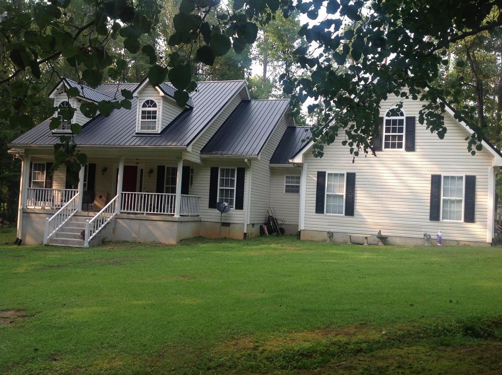 356 Elam Church Road Gray, GA 31032 - Photo 28 of 28 a view of a house with a yard and sitting area