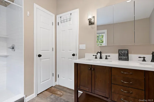 a view of cabinets a sink a counter top space and cabinets