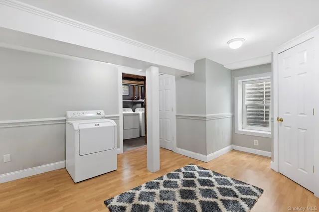 a view of a storage & utility room with washer and dryer