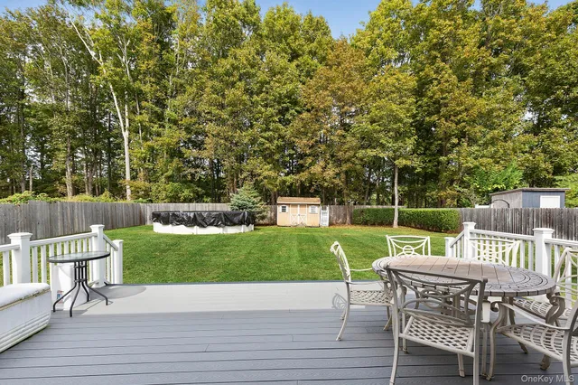 a view of a table and chairs in the patio