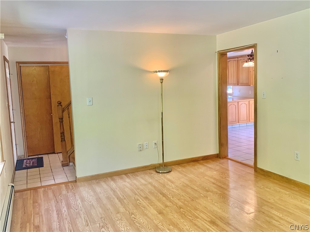10149 Bailey Lake Road Brookfield, NY 13480 - Photo 12 of 49 Living room looking toward front entrance and towa