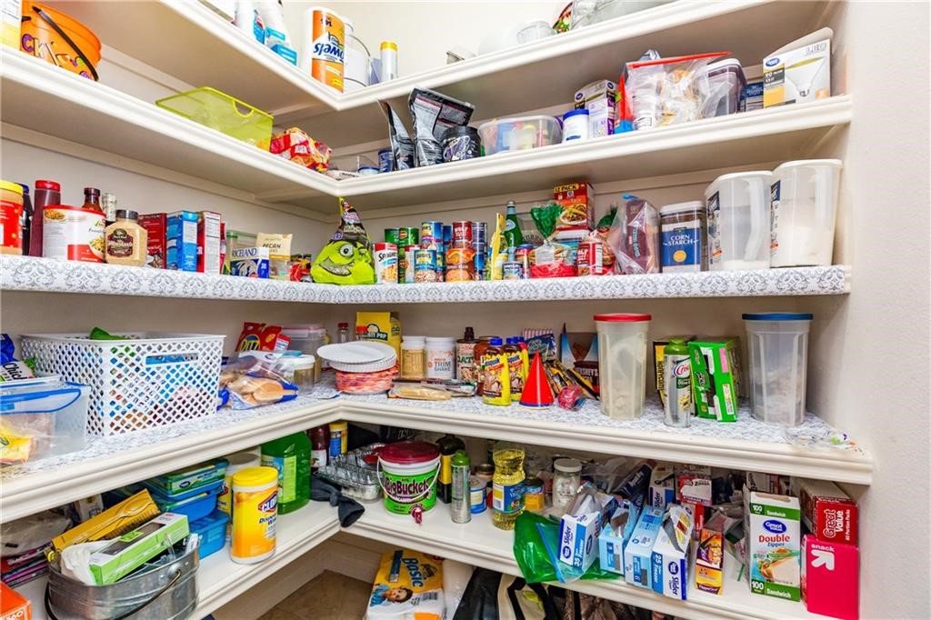 1306 Keenland Road Corpus Christi, TX 78418 - Photo 6 of 26 a room with lots of different kinds of food